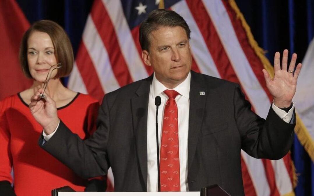 North Carolina Gov. Pat McCrory speaks to supporters as his wife Ann McCrory listens at an election rally in Raleigh last November.