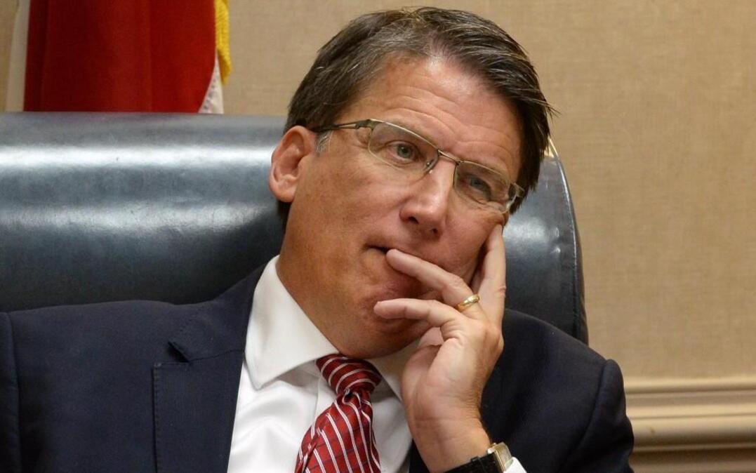 Gov. Pat McCrory listens as details about the status of a land sale is discussed during the Council of State meeting in Raleigh, N.C. , Tuesday, Dec. 6, 2016.