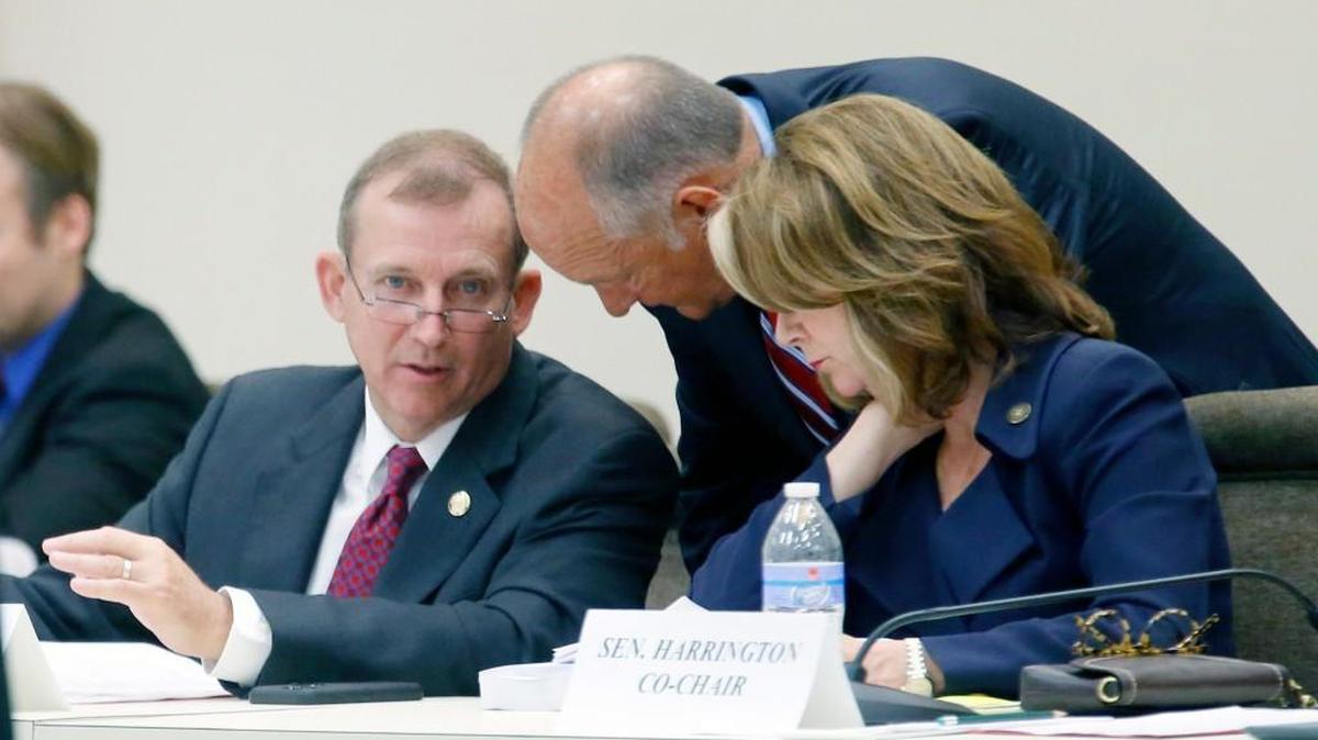 
Sen. Harry Brown, left, Sen. Brent Jackson, center, and Sen. Kathy Harrington confer during the Senate appropriations committee meeting on Tuesday, June 16, 2015 at the Legislative Office Building in Raleigh.
