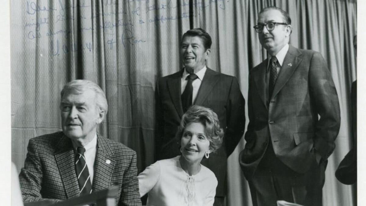 In 1976, then-Sen. Jesse Helms of North Carolina rescued the faltering presidential campaign of Republican Ronald Reagan by helping him win the state’s GOP primary. Here, in 1976, are (L to R) actor Jimmy Stewart, Nancy Reagan, Reagan and Helms.