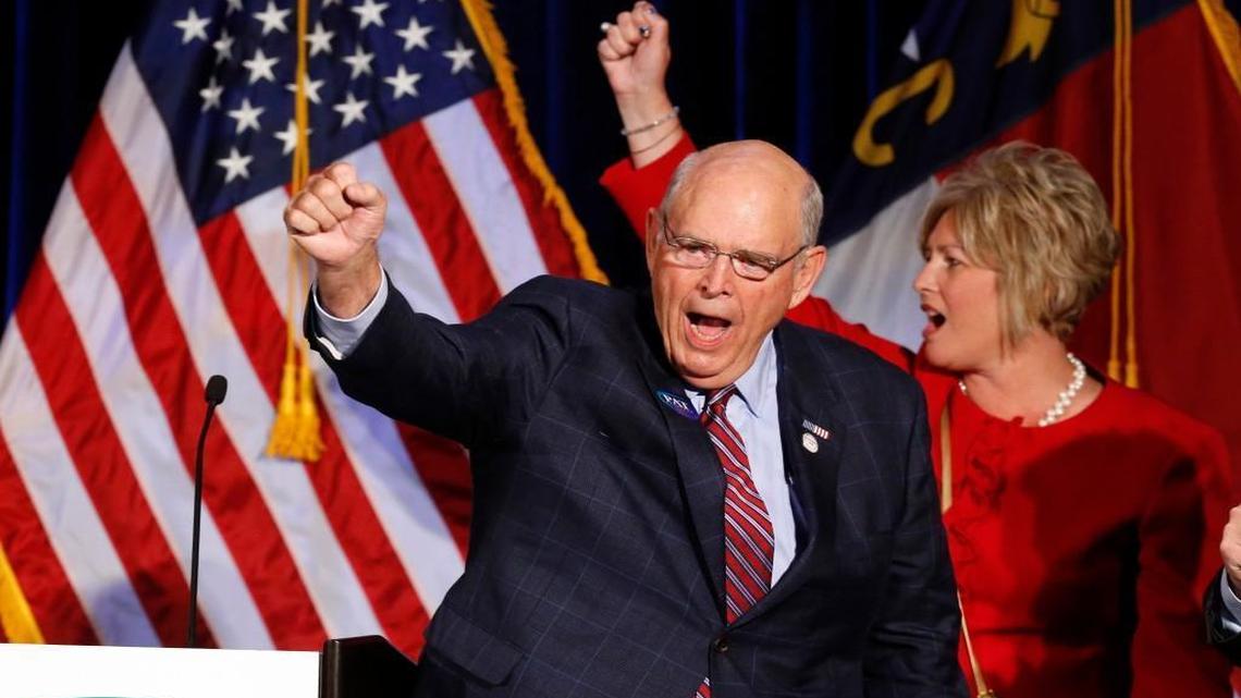 N.C. GOP Chairman Robin Hayes, left, and Vice-Chair Michele Nix cheer as favorable results come in as Republicans gather to watch election returns at the Raleigh Marriott Crabtree Valley in Raleigh, NC on Nov. 8, 2016.