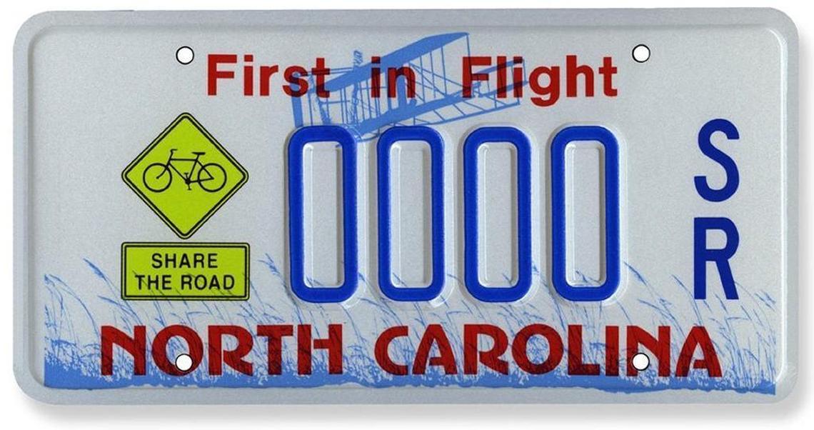 Many NC license plates feature the slogan “First in Flight” with a silhoutte of the Wright Brothers plane.