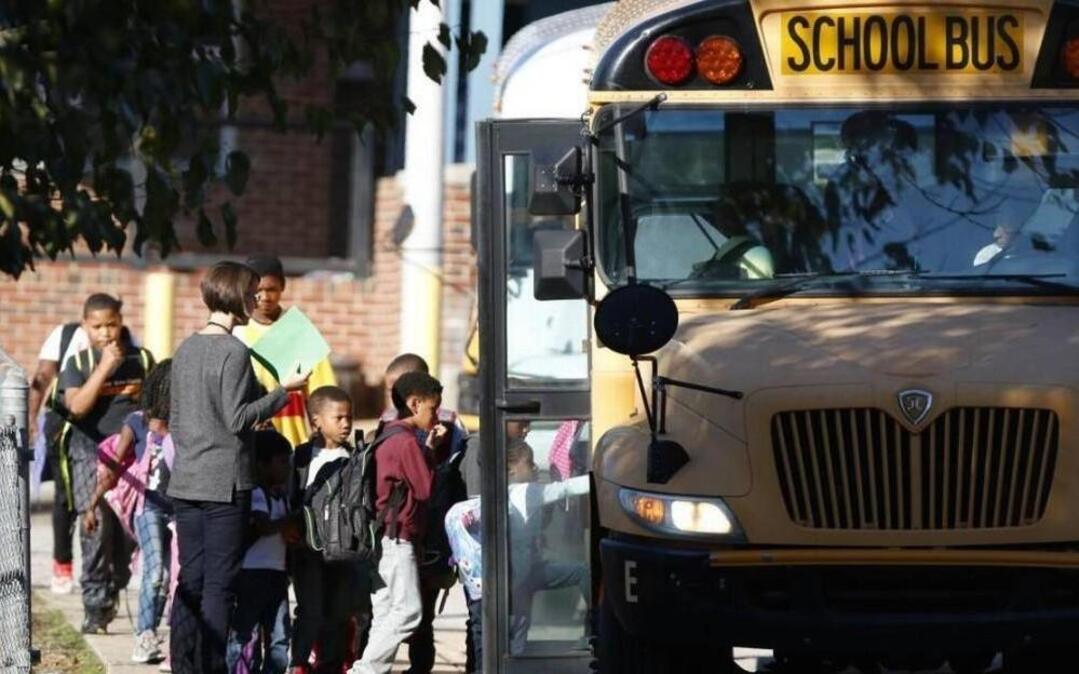 Students load a bus at Hunter Elementary School in Raleigh in 2015.