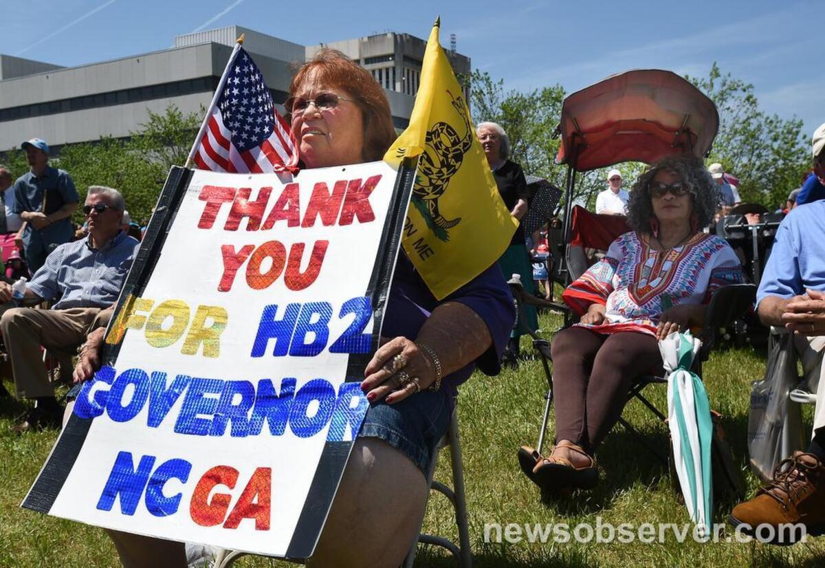Lee Churchill, of Raleigh, shows her support of HB2 during a rally on the Halifax Mall in Monday, April 25, 2016.