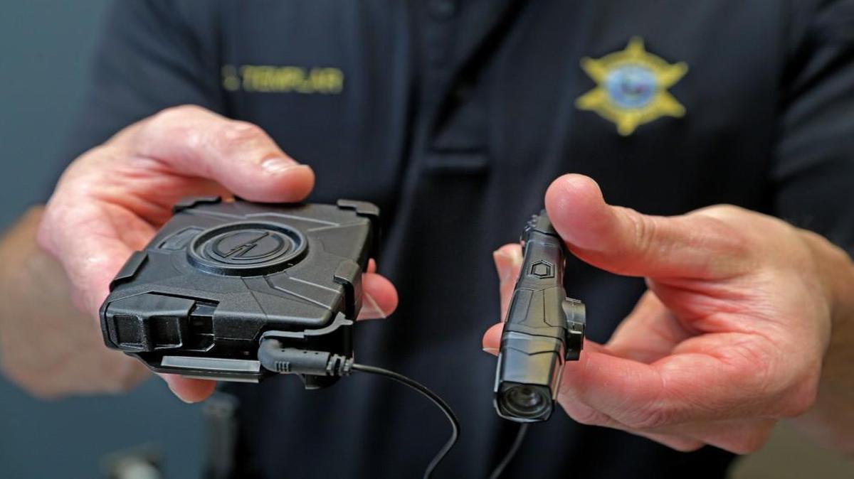 The Taser Axon Flex Body police camera, one of several types available to police departments.