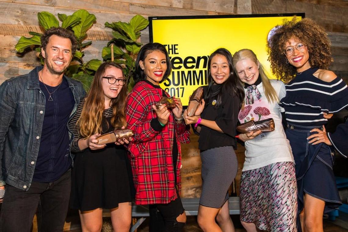 Blake Mycoskie, founder of TOMS shoes on the left, and Elaine Welteroth, Teen Vogue editor-in-chief, on the right, with Hunter Schafer, second from right, and other teens honored in the magazine’s 21 Under 21 Class of 2017.