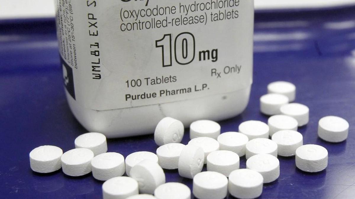 This Feb. 19, 2013, file photo, shows OxyContin pills arranged for a photo at a pharmacy in Montpelier, Vermont.