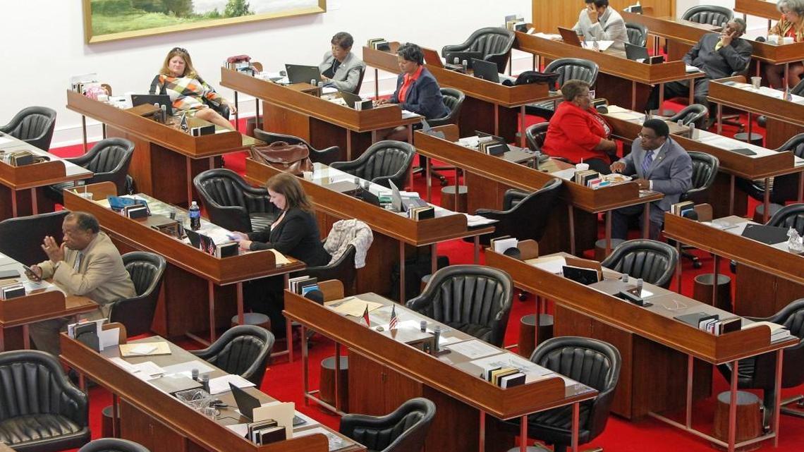 Democratic legislators hang around the House chambers while the Republicans caucus as they wait to re-convene at the N.C General Assembly on Sept. 24, 2015. Many seats in the House and Senate will have only one candidate in next year’s election.
