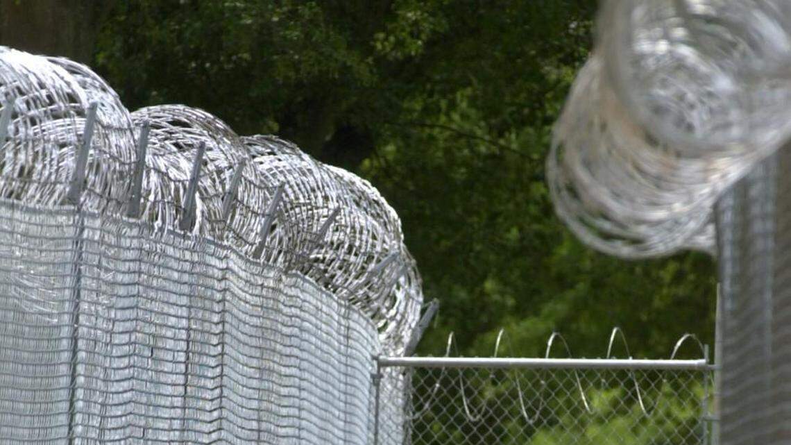 Barbed wire fences surround the North Carolina Correctional Institution for Women.