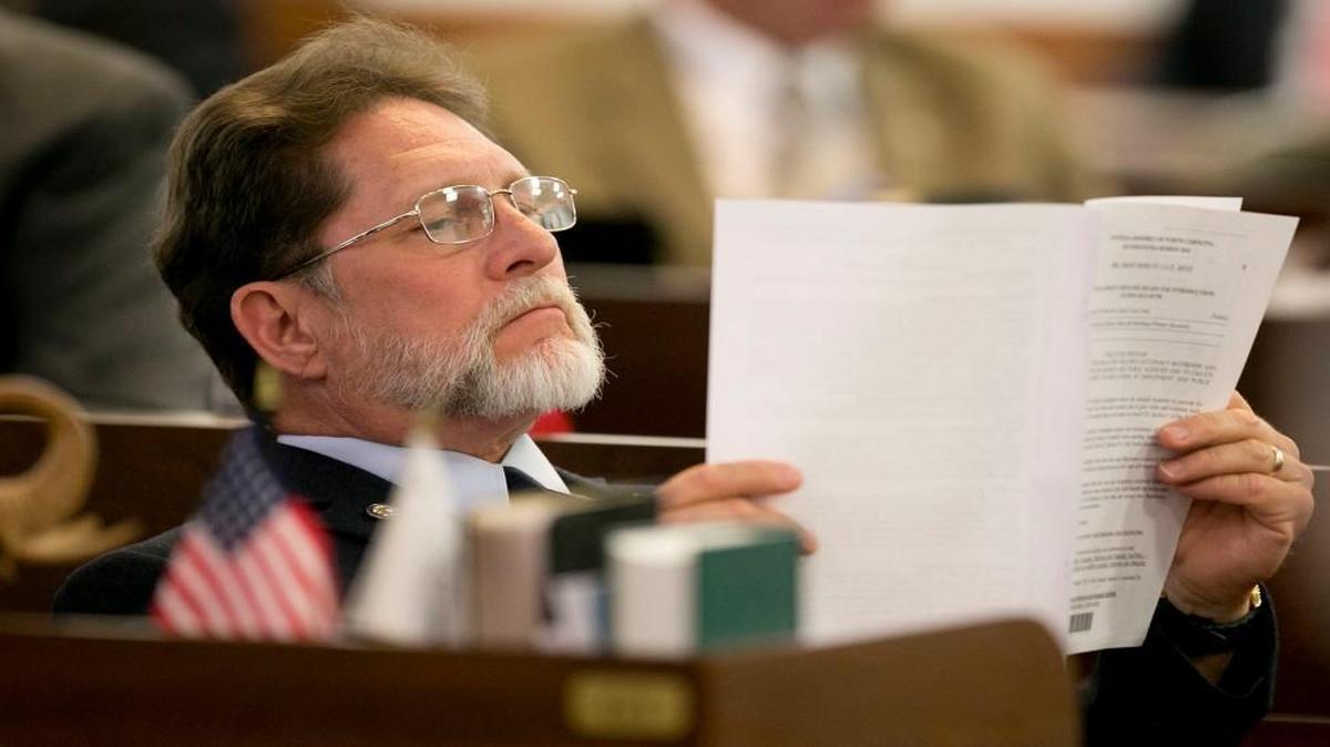 Rep. Larry G. Pittman of Concord reads over legislation on Wednesday, March 23, 2016 at the General Assembly in Raleigh, N.C.