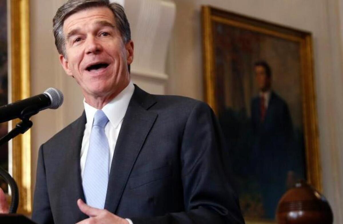Gov. Roy Cooper holds a news conference in Raleigh in March on a compromise bill to HB2.