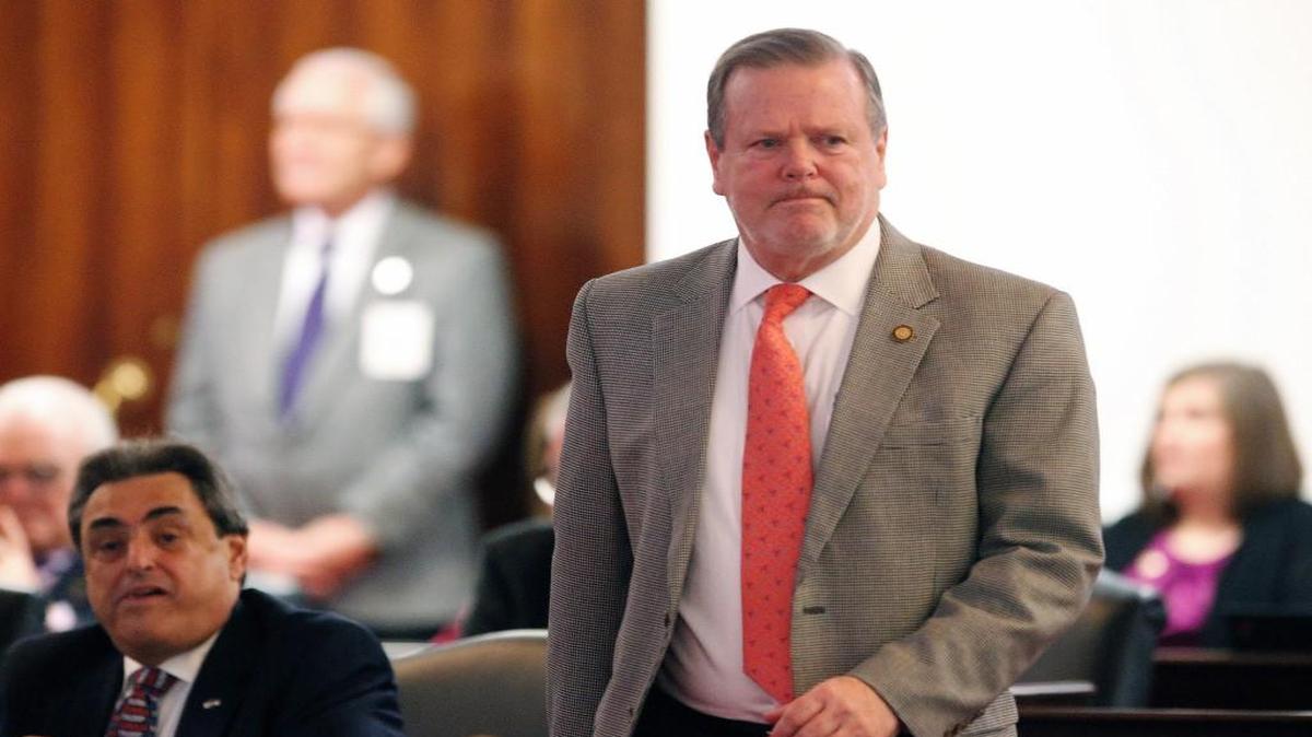 Senate leader Phil Berger walks across the floor of the chamber as the N.C. General Assembly reconvenes for a special session on Dec. 13, 2016.