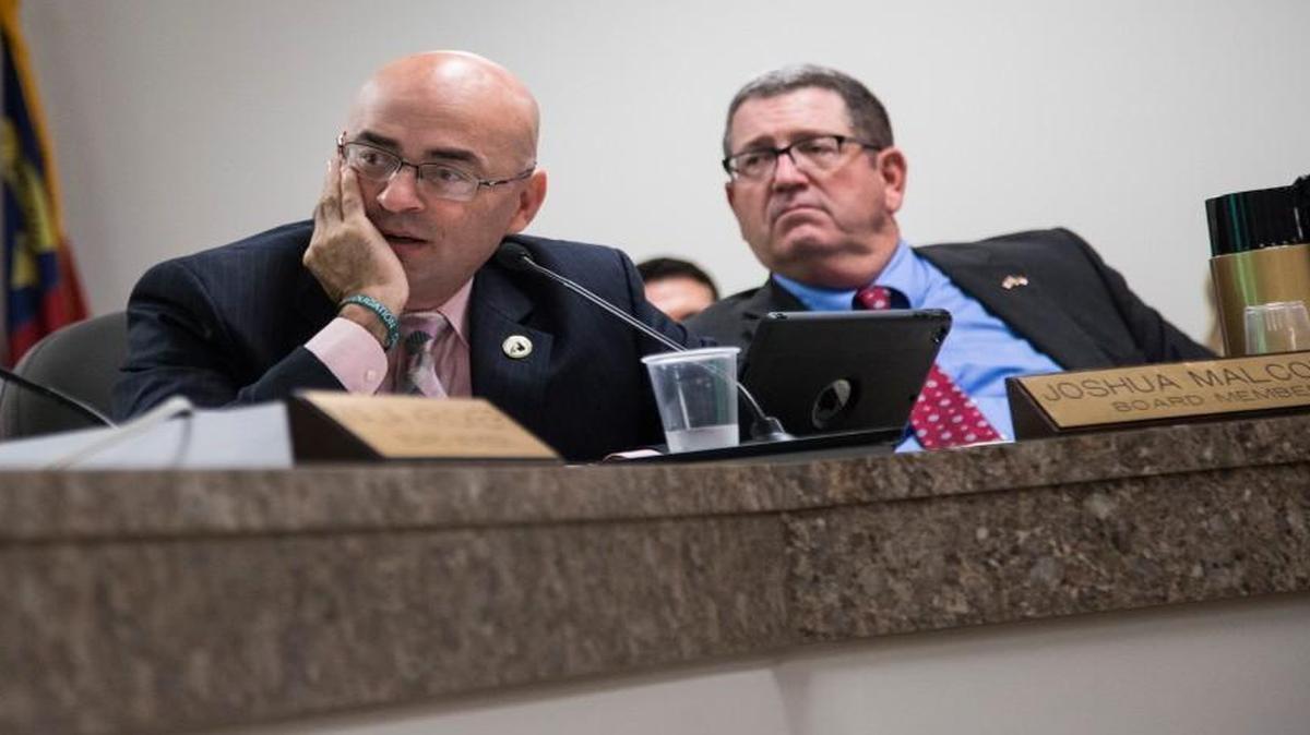 State Board of Elections members Joshua Malcolm, left, and A. Grant Whitney Jr. during a September board meeting. Malcolm, Whitney and three other current board members won’t be on the newly created Bipartisan State Board of Elections and Ethics Enforcement.