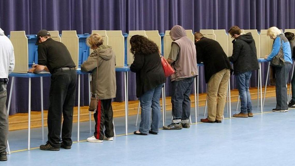 This file photo shows voters casting ballots in Raleigh. As the number of unaffiliated voters in North Carolina grows, Carrboro attorney Michael Crowell says unaffiliated voters should be allowed to help run elections, which are now under the exclusive control of the Democratic and Republican parties.