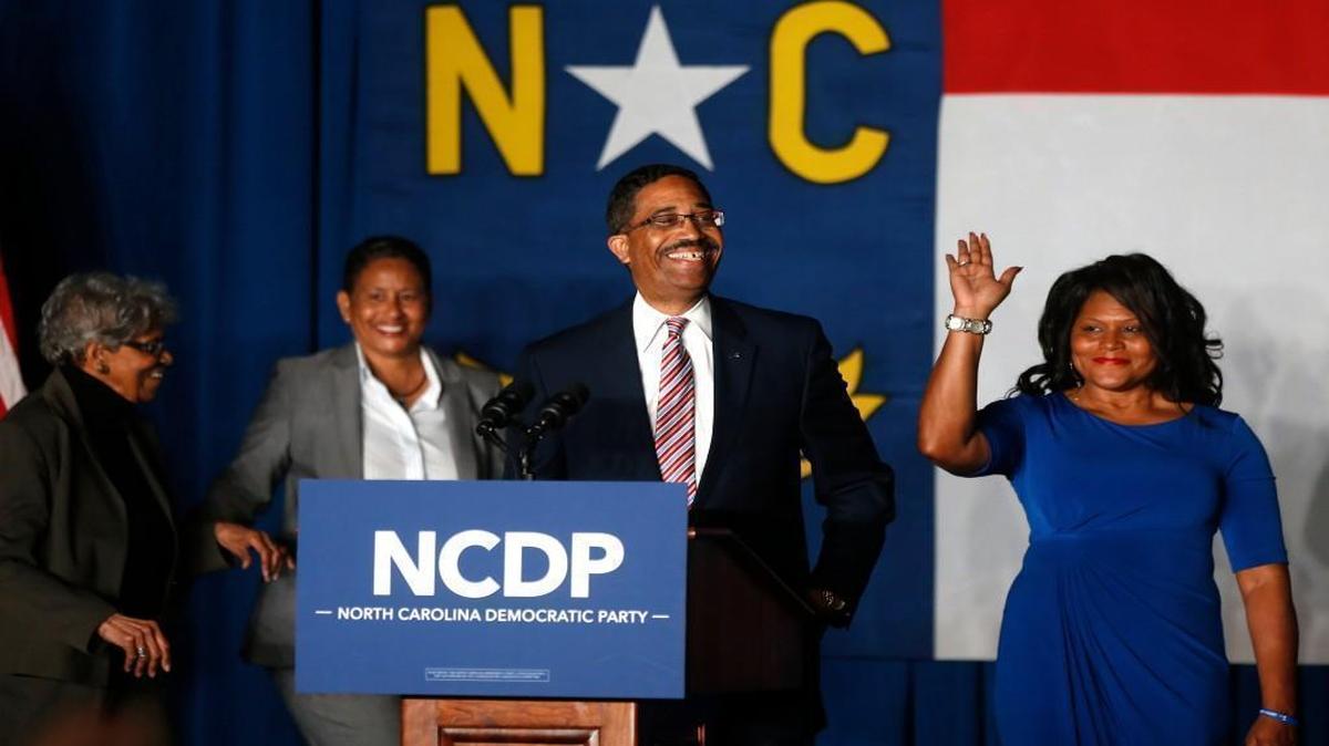 Judge Mike Morgan smiles as he takes the stage during an election party hosted by the North Carolina Democratic Party at the Raleigh Marriott City Center in downtown Raleigh, N.C., Tuesday, Nov. 8, 2016.