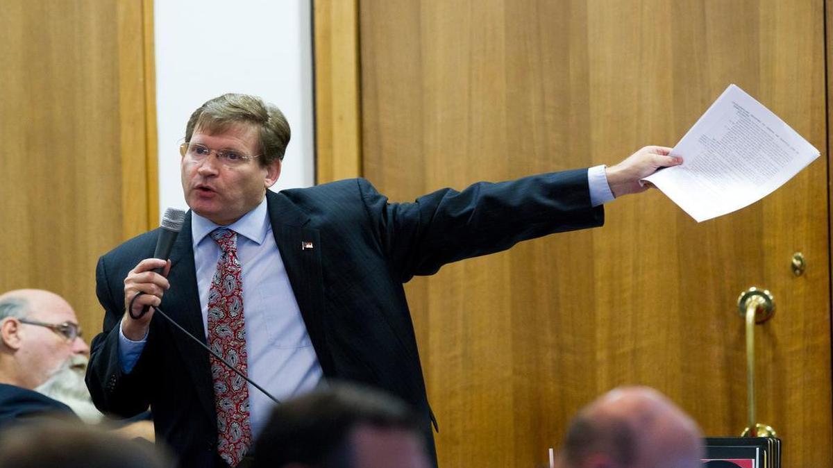 
Rep. Nelson Dollar, a Cary Republican and the House’s senior budget writer, explains the state budget proposal in 2014. Retailers say they only learned that the 2014 budget doubled their beer permit renewal fees – the sort of fee hike that can move unnoticed amid the fast-moving legislative budget process.
