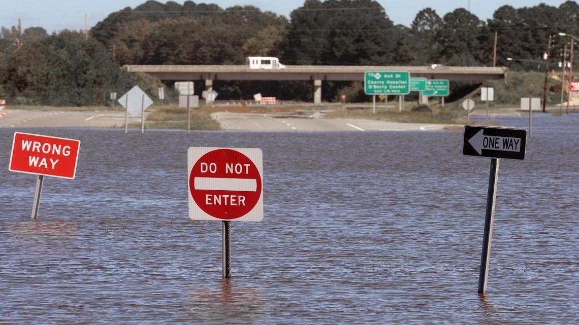 Highway 117 is under several feet of water in Goldsboro, N.C. Wednesday, Oct. 12, 2016.