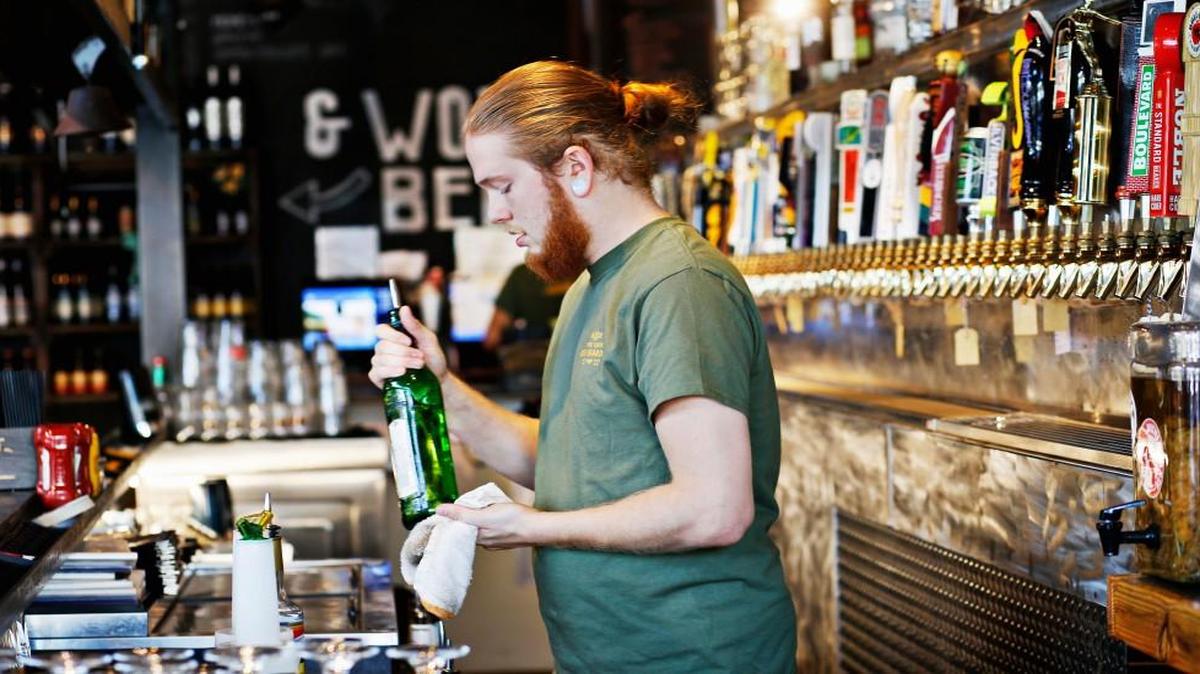 Brier Creek Beer Garden bartender Matt Braswell preps the bar before lunch service on Friday, Oct. 14, 2016.