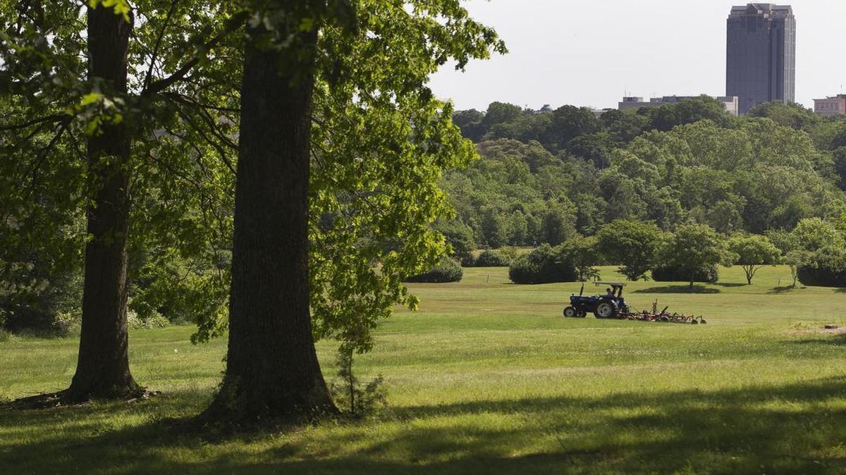 
Kenneth Johnson, a state employee assigned to Dorothea Dix maintenance, mows a large meadow on Tuesday at the Dorothea Dix Hospital Campus in Raleigh shortly after the State of North Carolina agreed to sell the property to the City of Raleigh for $52 million.
