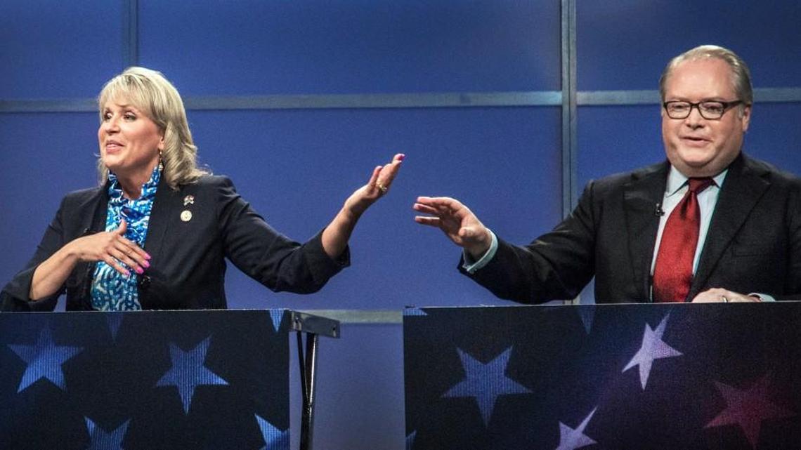 Rep. Renee Ellmers and Rep. George Holding face off Thursday during the 2nd Congressional District Republican primary debate at WRAL studio in Raleigh.