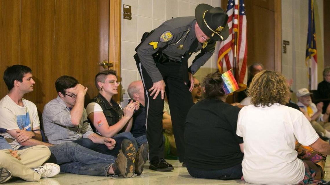 General Assembly police get ready to arrest the last of the 54 activists that staged a sit-in in front of House Speaker Tim Moore’s office in opposition to House Bill 2 at the State Legislative Building in Raleigh, N.C. on Monday April 25, 2016.