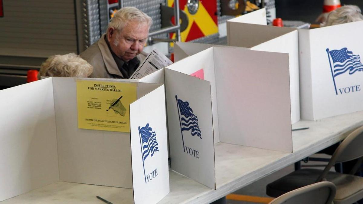 
Bill Bailey checks his ballot as he votes at Johnston Co. Precinct 10a at the Clayton Fire Station in Clayton on Nov. 5, 2014. House Speaker Tim Moore said legislators plan to set all 2016 primary elections for March.
