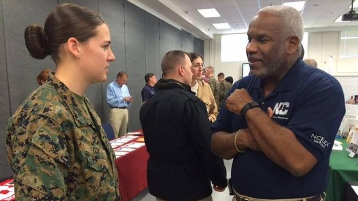 Steve Grant, right, the former policy and governance manager at the N.C. Office of Human Resources, won a wrongful termination lawsuit against Gov. Roy Cooper’s administration in September. Grant is pictured here, on the job for a state government recruiting event, in March 2016 at Marine Corps Air Station Cherry Point. Grant served 20 years in the Marines before starting his own state government career.