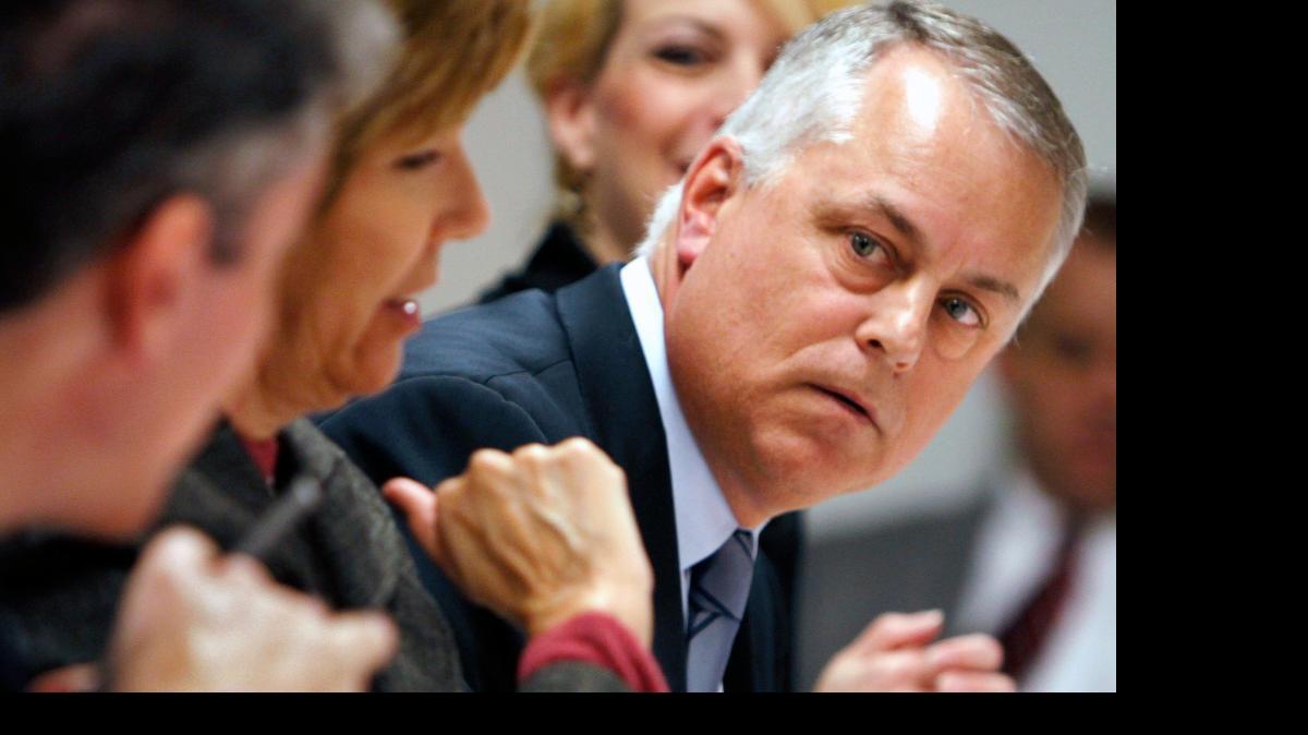 
Wake County Schools Superintendent Tony Tata listens to board member Jim Martin, left, during a work session Tuesday, January 10, 2012. 
