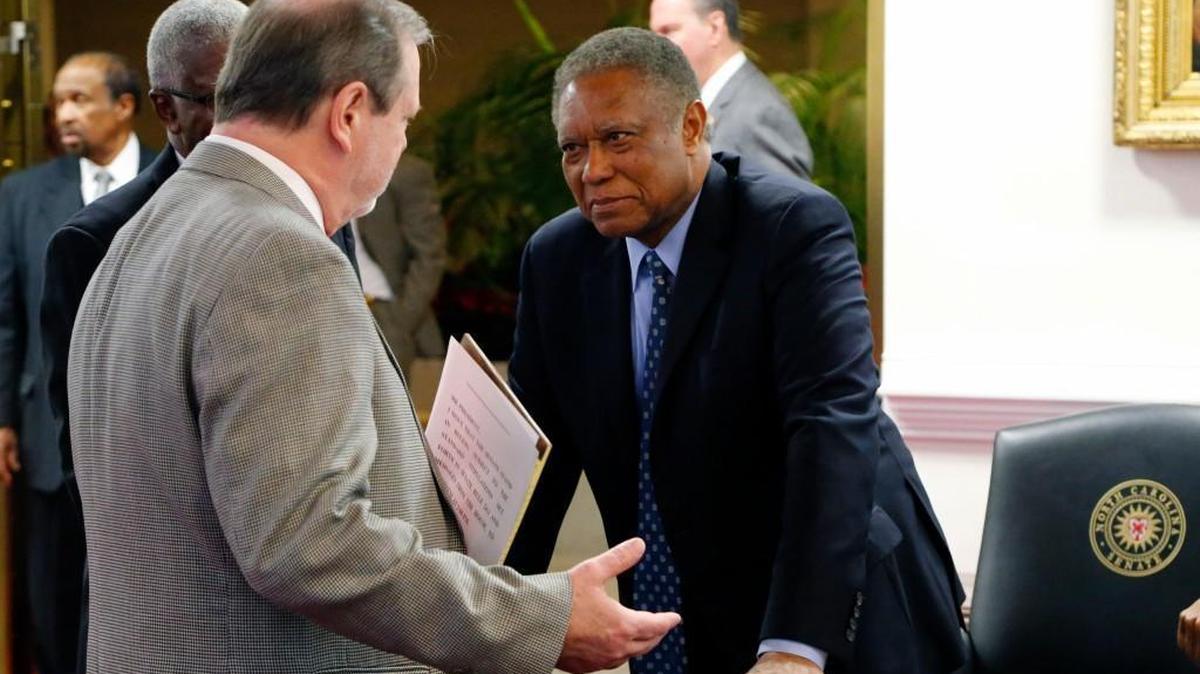 Senate leader Phil Berger (Rep), left, confers with Sen. Dan Blue (Dem) as the N.C. General Assembly reconvenes for a special session this week.
