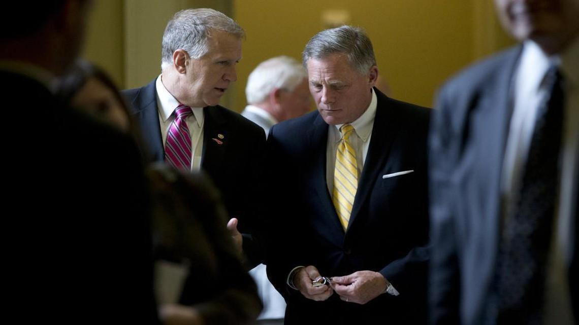 Sen. Thom Tillis, R-N.C., left, and Sen. Richard Burr, R-N.C., voted to oppose a Senate trial for former President Bush.