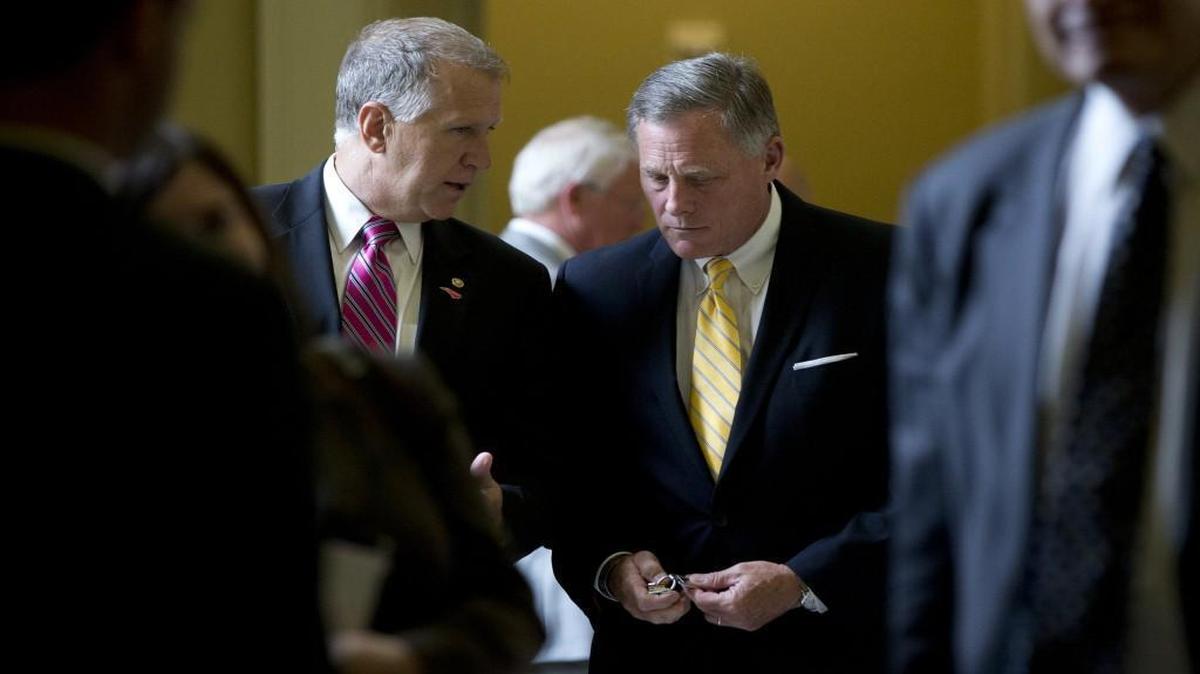 Sen. Thom Tillis, R-N.C., left, and Sen. Richard Burr, R-N.C., walk from a policy luncheon on Capitol Hill in Washington in 2015.
