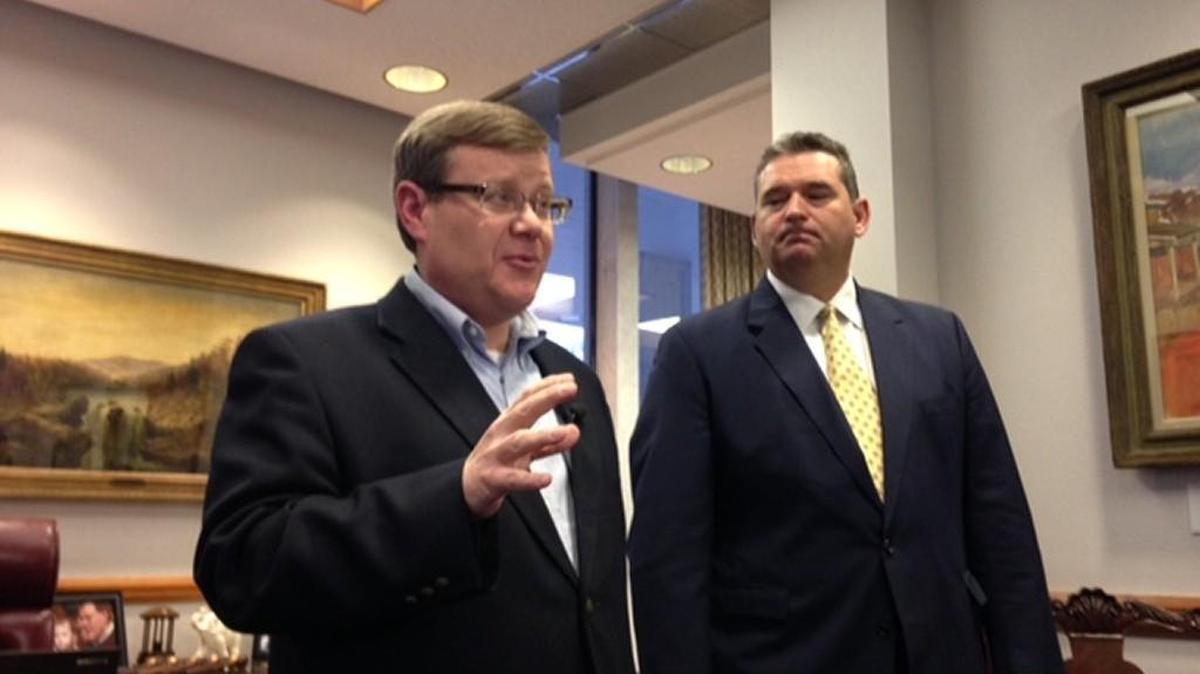 House Speaker Tim Moore, left, and House redistricting committee chairman David Lewis discuss next week’s plans with reporters.