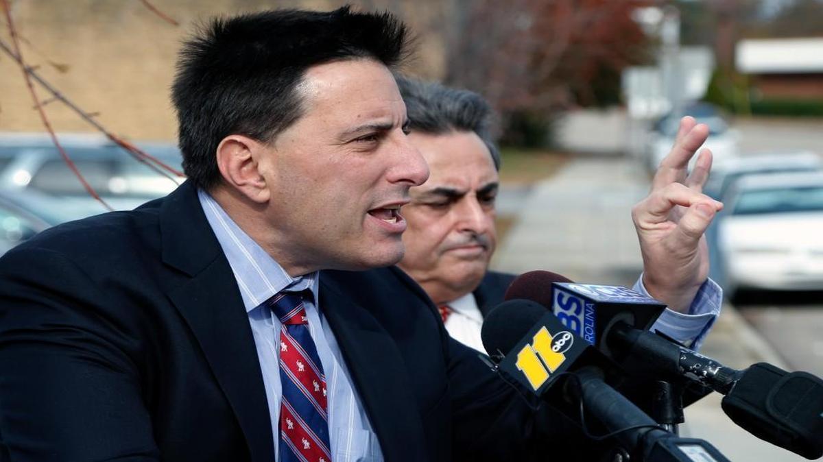 Dallas Woodhouse, executive director of the N.C. Republican party, left, and N.C. Republican Sen. Bob Rucho hold a press conference outside the N.C. Board of Elections building in Raleigh Wednesday afternoon, Nov. 30, 2016.