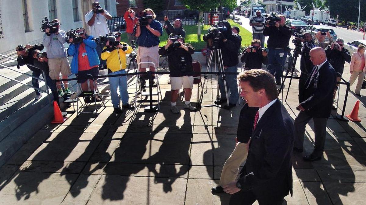 Former federal prosecutor Bobby Higdon, who led the prosecution of former Sen. John Edwards that ended with acquittal of five of the charges and dismissal of another, has been nominated to be the U.S. Attorney in the Eastern District of NC. Edwards, center, walks past media into the Greensboro courthouse where the trial was held in 2012.