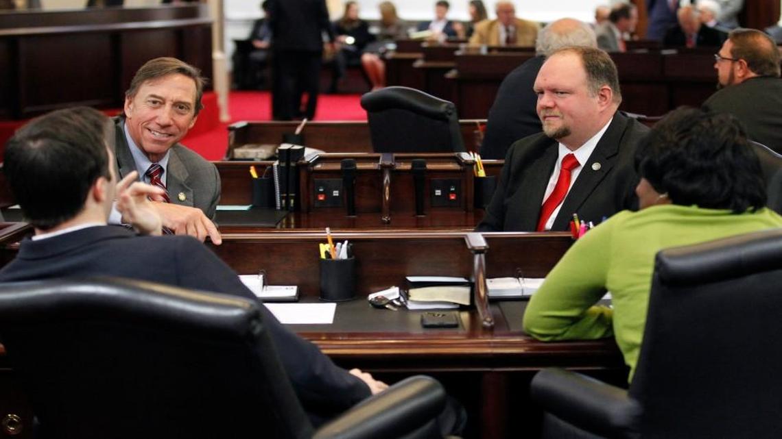 Clockwise from back left, Sen. Rick Gunn and Sen. Ralph Hise confer with Sen. Valerie Foushee and Sen. Jeff Jackson as the N.C. General Assembly reconvenes for a special session on Dec. 13, 2016.