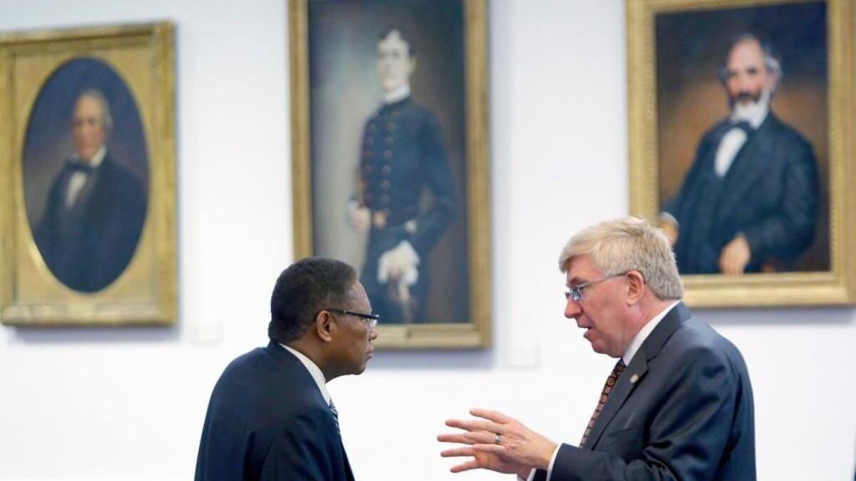 
Sen. Dan Blue, left, and Sen.Tom McInnis confer on the floor of the Senate chambers at the N.C General Assembly on Sept. 24, 2015. 
