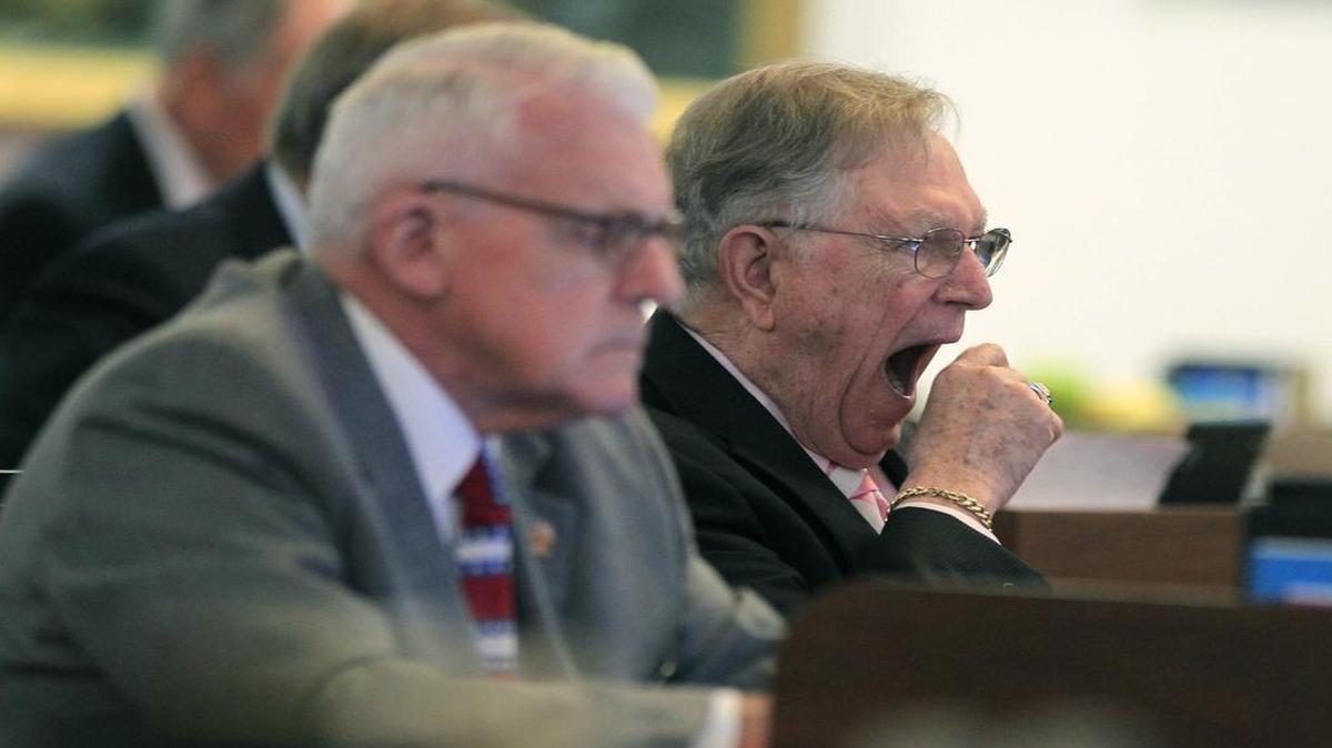 
Rep. James Langdon, Jr., let out a yawn while sitting next to Rep. George Cleveland during a 12-hour N.C. House session Wednesday. Cleveland said he took a nap after the session ended around 2:30 a.m. Thursday.
