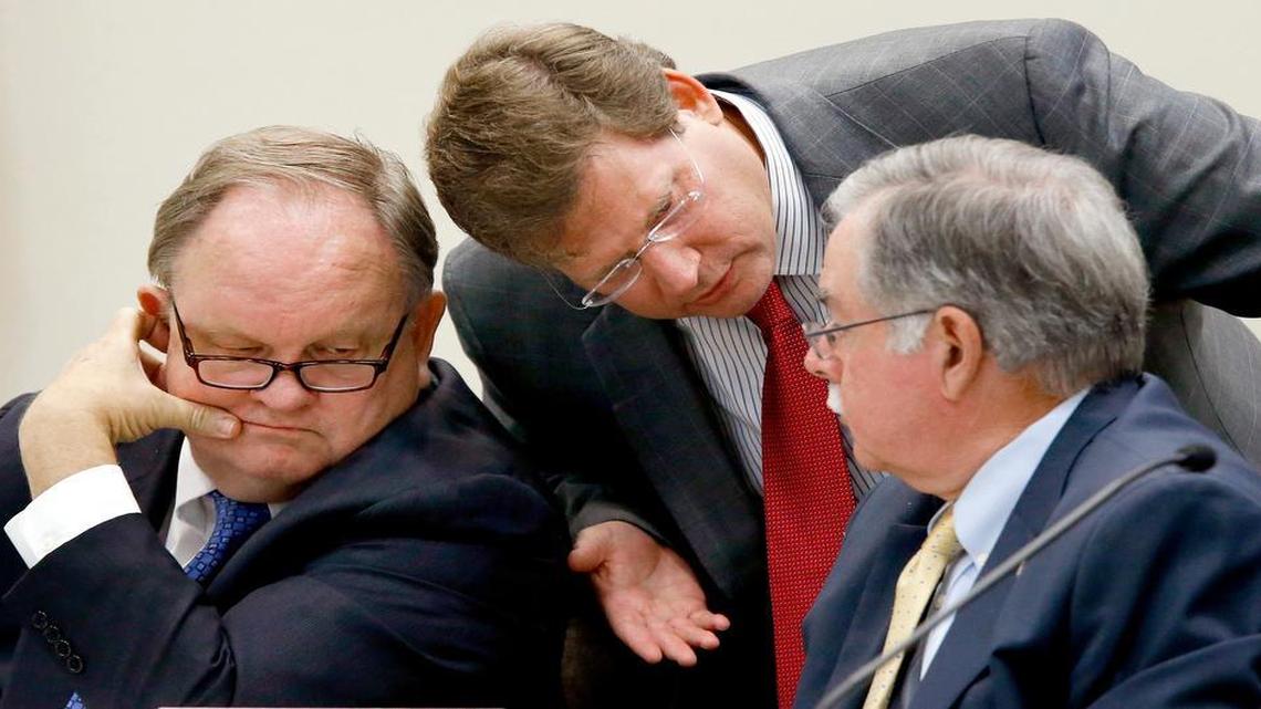 
Rep. Nelson Dollar (R-Wake), center, senior chair of the House Appropriations committee, confers with other committee chairs Rep. Chuck McGrady (R-Henderson), left, and Rep. Donny Lambeth (R-Forsyth) during a committee meeting Wednesday.

