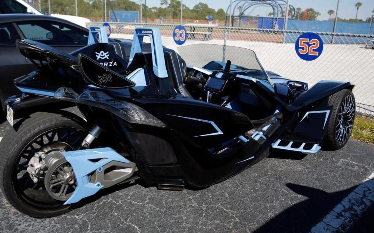 A Polaris Slingshot belonging to New York Mets' Yoenis Cespedes sits in the team parking lot during spring training baseball practice Saturday, Feb. 27, 2016, in Port St. Lucie, Fla.