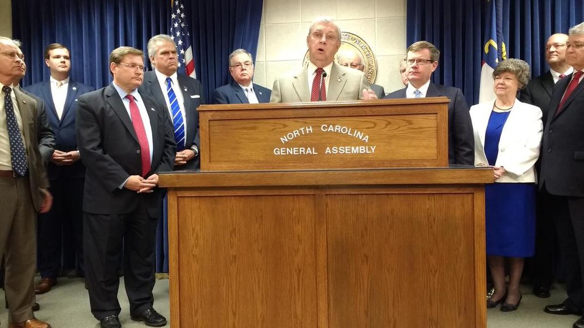 Rep. Craig Horn, center, and other House budget committee chairs promote their budget proposal during a news conference.