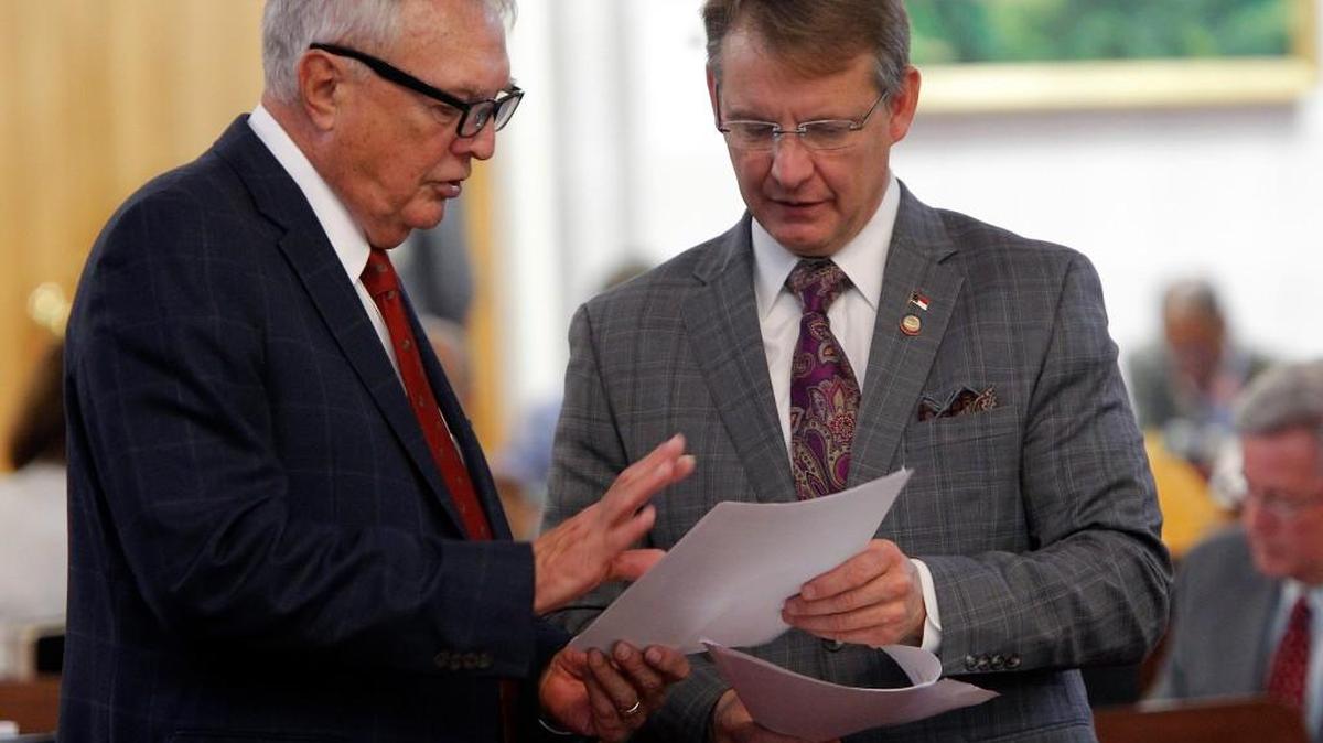 House Majority Leader Mike Hager, right, said proposed income tax changes discussed Tuesday would benefit low-income and middle-class families as well as attract technology companies to the state.