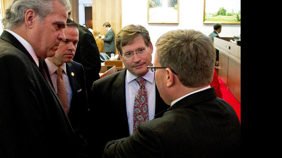 
From left, Representatives John Torbett, Justin Burr, Nelson Dollar and Tim Moore, confer during N.C. House budget deliberations in 2014. Positive revenue projections are expected to make this year’s budget talks more flexible, but some budget writers are urging “fiscal responsibility.”
