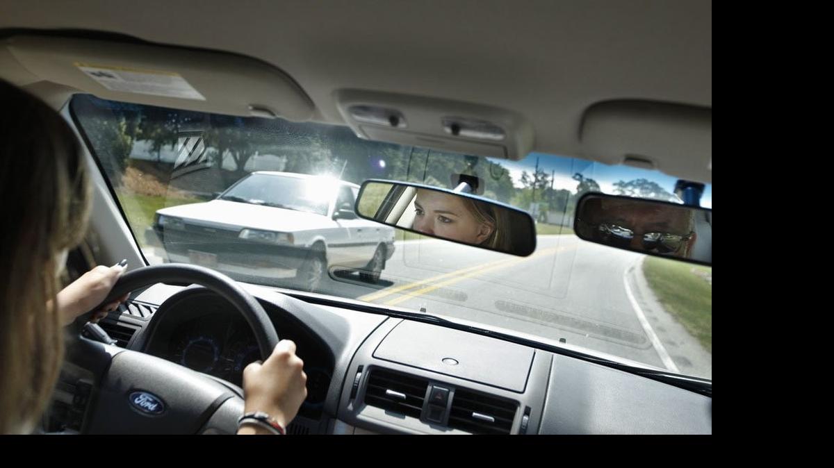 
A 2011 file photo shows Alexandria Hurley, then 14, learning to drive under the supervision of Jordan Driving School instructor Thomas Hunter in Apex. 
