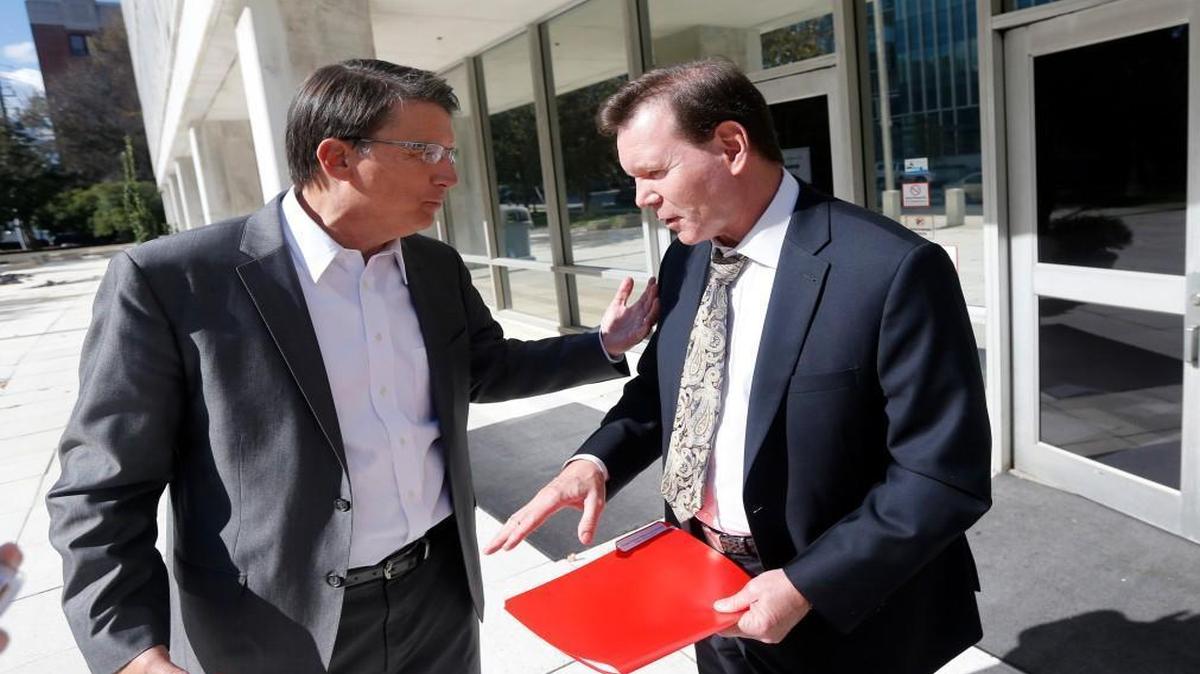 Gov. Pat McCrory and Secretary of Administration Bill Daughtridge discussed Project Phoenix outside a state office building last year.
