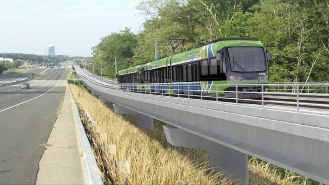 
An artist's rendering of a light-rail train running beside U.S. 15-501 over New Hope Creek in Durham.
