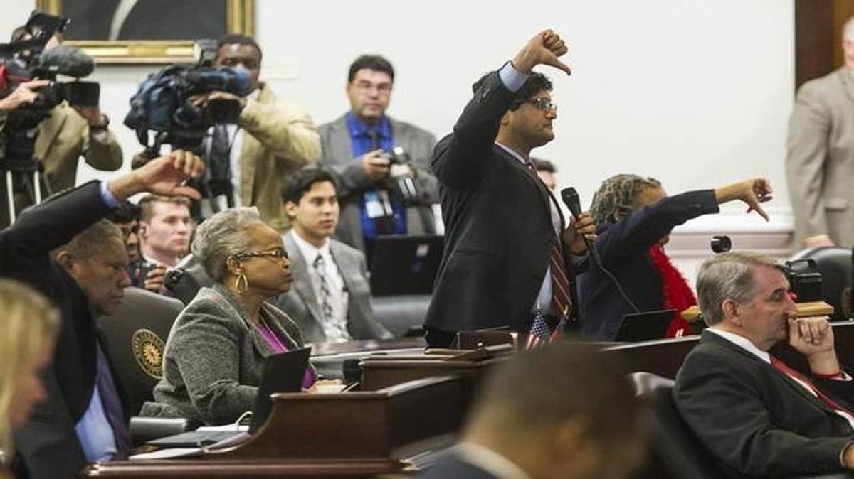 Democratic senators including Jay Chaudhuri, center, vote during a session in December.