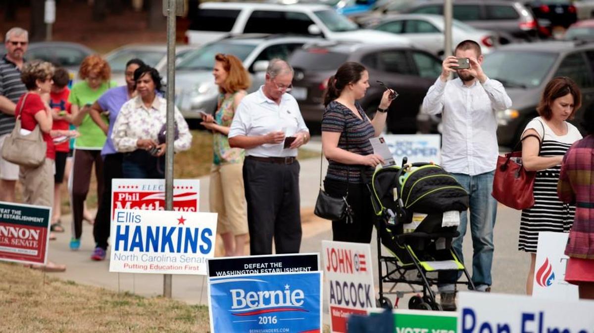 Wake county voters waited in line to vote at the Lake Lynn Community Center in north Raleigh early voting site in Raleigh, NC midday Friday, March 11, 2016. Voting officials let in four voters at a time to keep the inside lines filled. The Lake Lynn Community Center in Raleigh early voting site was leading in the total number of early voters in Wake county this week. Early voting ends Saturday with the normal primary election next Tuesday, March 15, 2016.