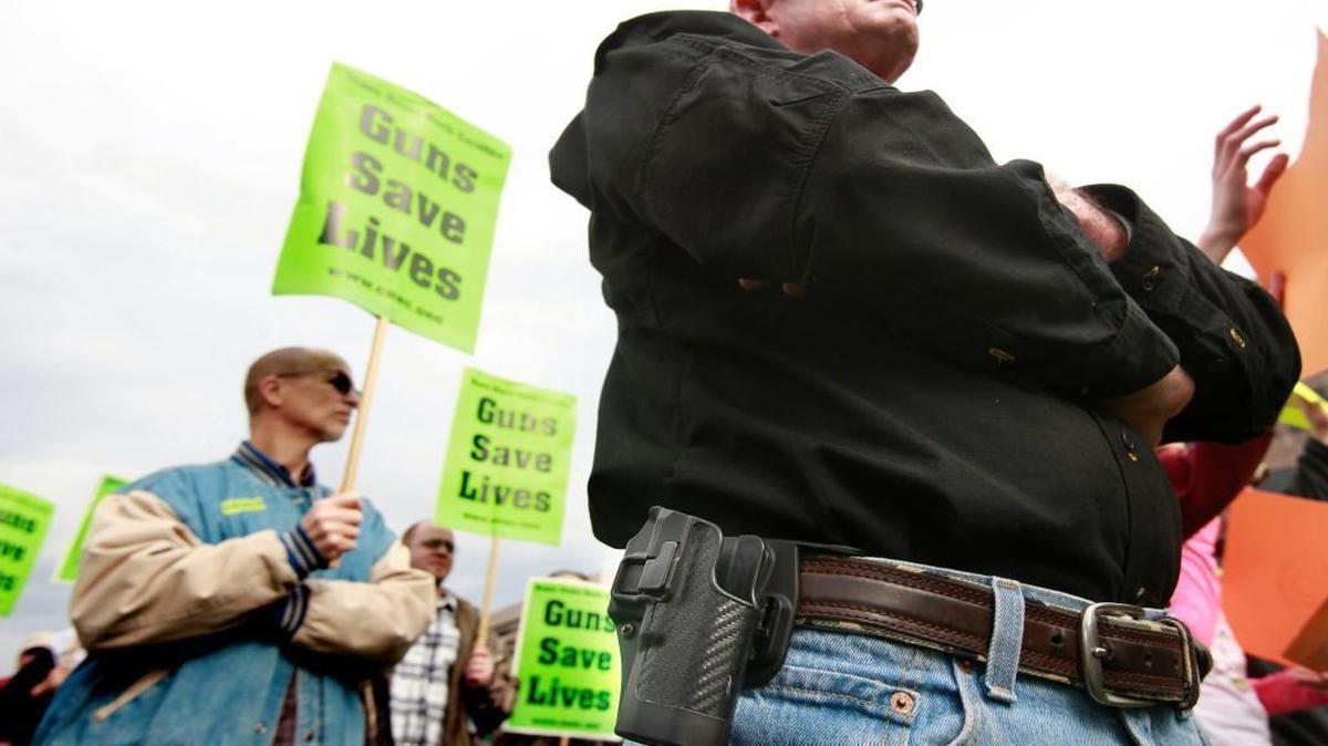 Steve Huegel, of Youngsville, N.C., sports his empty gun holster at the Grass Roots North Carolina Second Amendment Freedom Rally in Raleigh, N.C. on Tuesday, February 5, 2013. Huegel, his wife and kids all had concealed carry weapons permits.