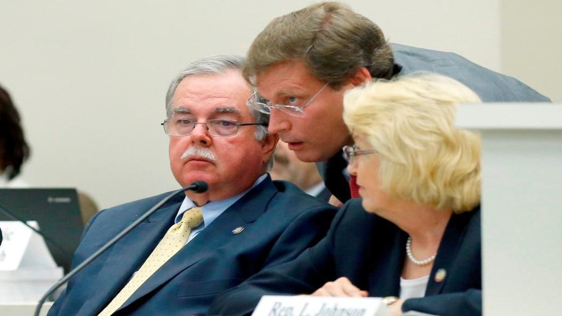 
Rep. Nelson Dollar, center, senior House budget chairman, confers with fellow budget writers Rep. Donny Lambeth and Rep. Linda Johnson.
