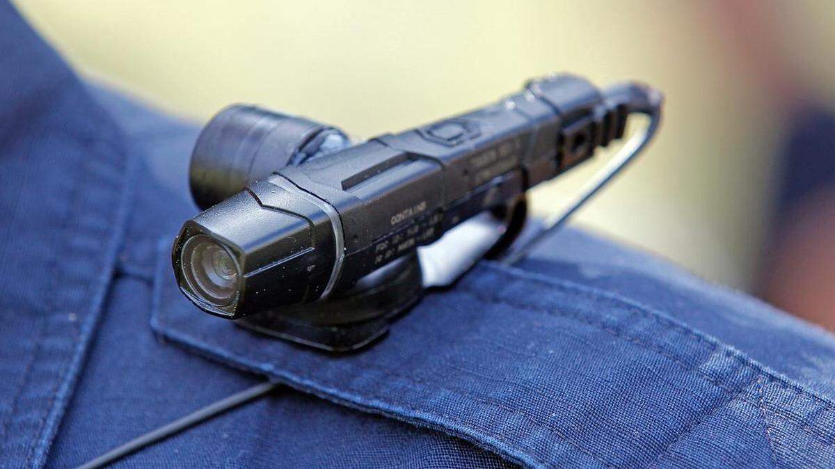 
Garner police officer Kevin Murray tests a body camera as he wears one before starting his patrol in Garner on April 8, 2015. A bill currently being considered in the General Assembly would require all major NC law enforcement agencies to equip their officers with body-worn cameras.
